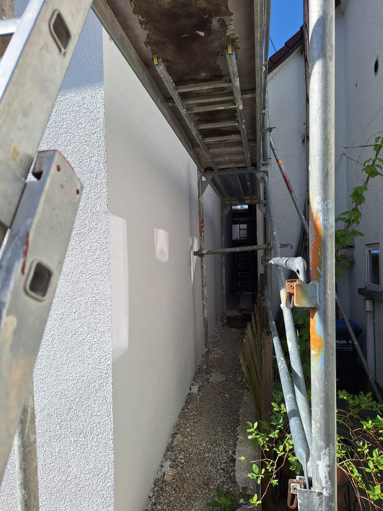 Fassade nach der Sanierung – Neuer Putz